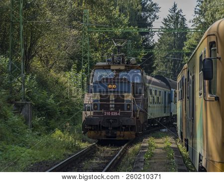Blue Electric Train In Station Rozmberk Nad Vltavou In Summer Day