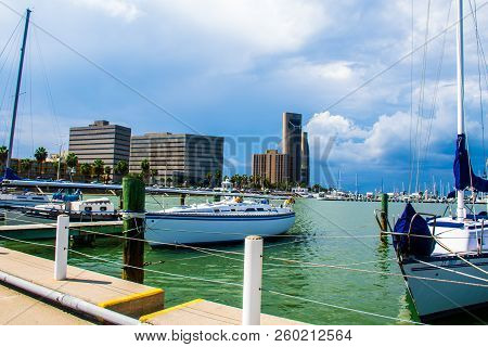 Corpus Christi Texas Bayfront Harbor With Boats And Sail Boats And Yatchs Parked Ready For A Sunny D
