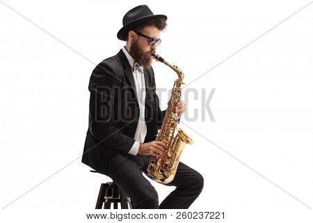 Jazz musician playing saxophone isolated on white background
