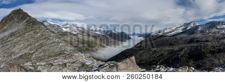 Monte Moro Pass From Switzerland Into Italy And The Stausee Lake Near Saas Fee In The Southern Swiss