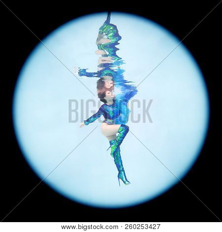 An Underwater Portrait Of A Woman Wearing Green And Blue Sequined Stilletto Boots And Matching Shirt