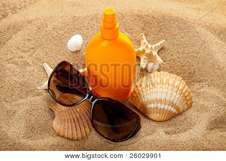Summer Beach - Suntan Oil And Dark Glasses On Sand