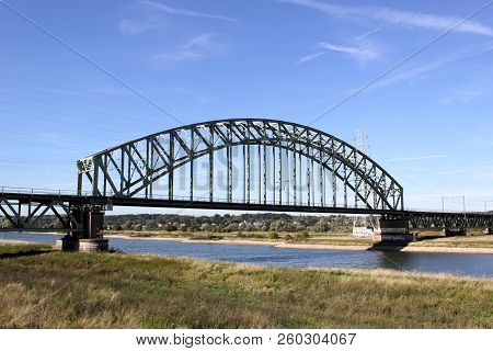 The River Rhine And The Railway Bridge Near Oosterbeek And Arnhem