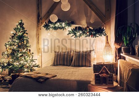 Warm And Cozy Evening In Living Room. Sofa Bed In Christmas Interior. Concept The New Year And Holid