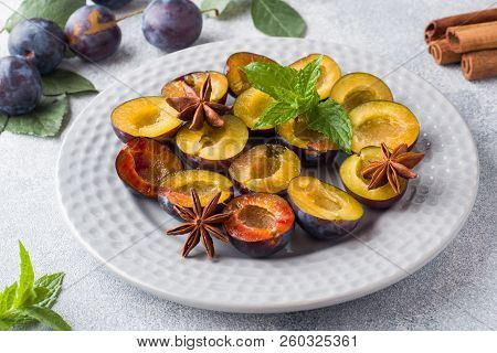 Fresh Berries Plums In The Context Of Cooking On The Plate