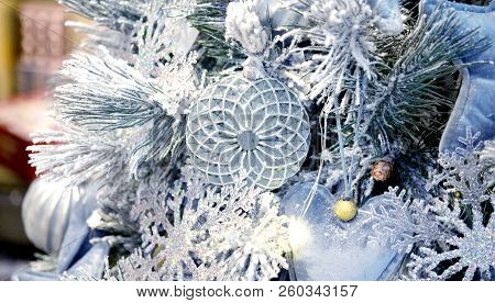 Decorative Snow-covered Christmas Tree Decorated With Decorative