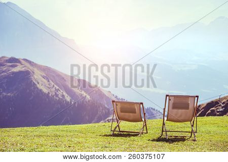 Two Chairs In The Mountains