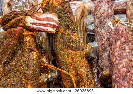 Closeup, Assorted Different Kinds Of Meat: Salami, Sausages, Smoked Meat.