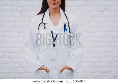 Nurse Help People With Therapy Room. Practitioner With Medicament Help People. Healthcare With Peopl