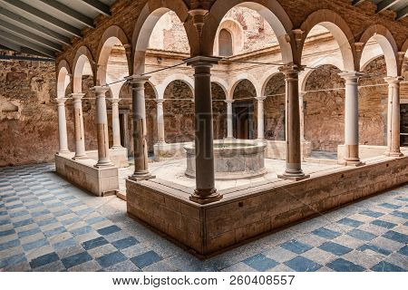 Lower Cloister Of The Carthusian Monastery Of Escaladei, Founded In The 12th Century. Located In Cat
