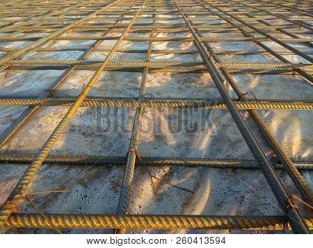 Abstract Background Of Iron Armature Ready For Concreting Metal Armature In Reinforced Concrete Stru