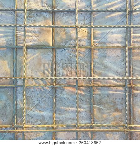 Abstract Background Of Iron Armature Ready For Concreting Metal Armature In Reinforced Concrete Stru