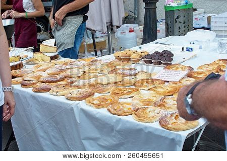 Mallorca, Spain - September 5, 2018: Mallorquin Pastries Ensaimadas In The Sineu Market On A Sunny D