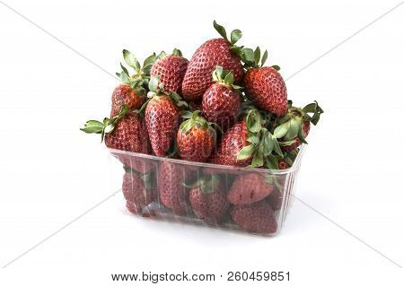 Fresh Strawberry In Shop Plastic Boxes, White Background