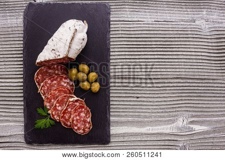 Saucisson Sec Delicious French Salami On A Wooden Background