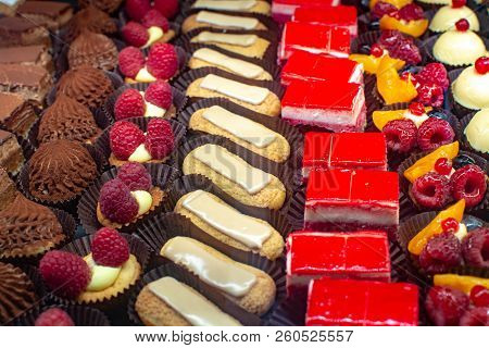Variety Of Fresh Baked Homemade Cakes In Small French Bakery In Provence Close Up