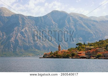 Beautiful Mediterranean Landscape With A Small Seaside Village In The Background Of The Mountains. M