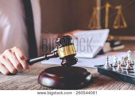 Male Lawyer Or Judge Working With Law Book, Gavel And Balance, Report The Case On Table In Office, L