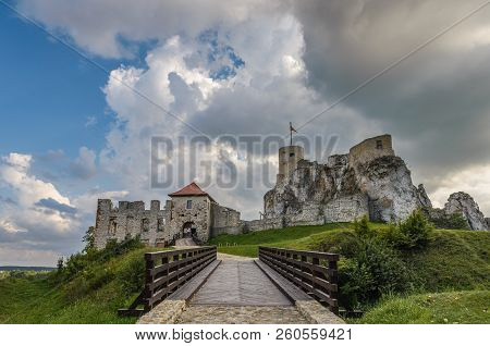 Ruins Of Rabsztyn Castle Near Krakow, Poland With Beautiful Clouds In Background.
