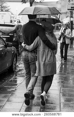 Vilnius, Lithuania - May 17, 2014: Heavy Rain Started. Some Get Back To The Cars, Others Took Their 