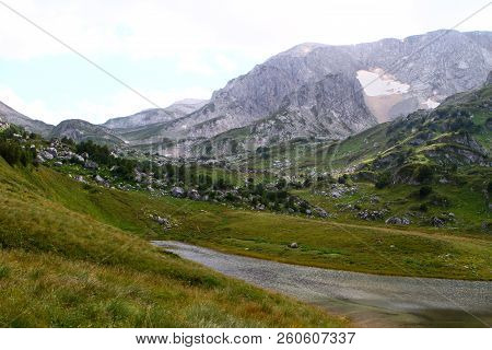 Small Nice Mountain Lake Psenodah In North Caucasus Near Fisht And Oshten Mountains, Natural Landsca