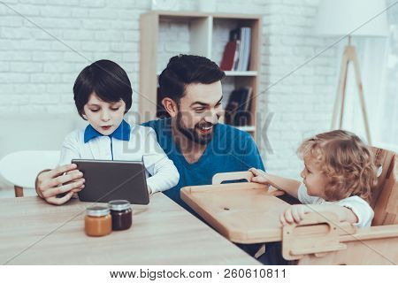 Tablet. Spends Time. Happy Together. Leisure Time. Smiling Kids. Father. Flakes With Milk. Delisious
