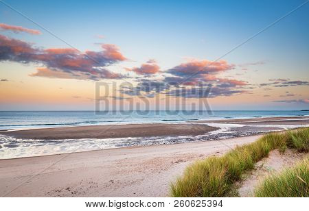 Druridge Bay Sandy Beach Near Sunset, Which Is A Seven Mile Long Beach In Northumberland Between Amb
