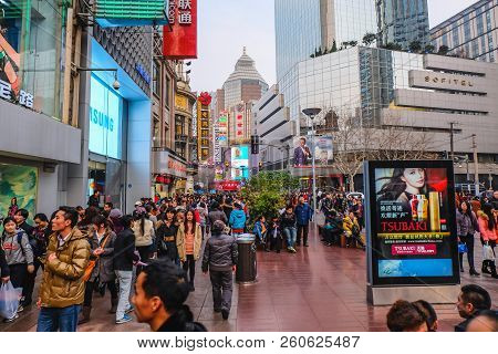 Shanghai/china -  January 24 2015: People Walking In Nanjing Road Walking Street In Shang Hai City C