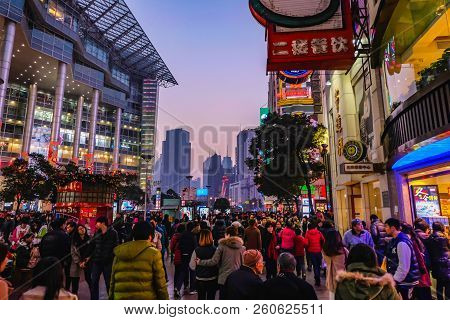 Shanghai/china -  January 24 2015: Night Life Of People Walking In Nanjing Road Walking Street In Sh