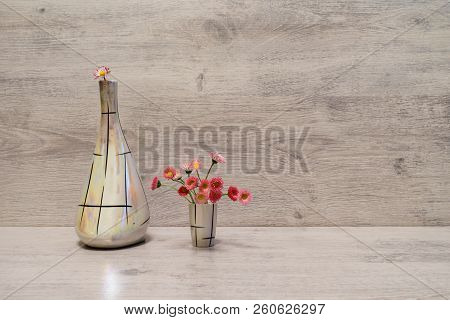 Summer Creative Still Life In Minimal Style. White And Pink Marguerite Daisy Flowers In Vintage Pear