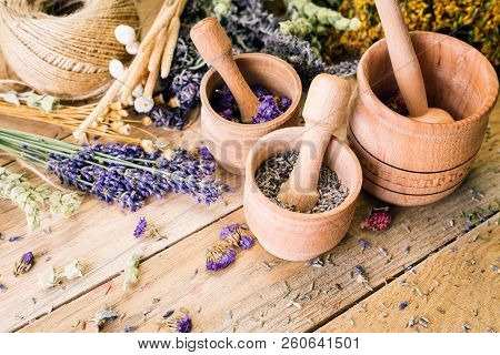 Herbal Tea, Preparation Of Medicinal Herbs, Mortar, Non-traditional Medicine, Ayurveda, Wooden Backg