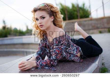 Beautiful Young Woman With Long Curly Hair, Blond, Long Black Eyelashes And Light Make-up, Cute Smil