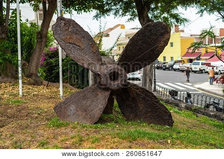 Puerto De La Cruz, Spain - July 19, 2018: Rusty Propeller Of Ms Titilis Transport Ship (+1910) Sunke