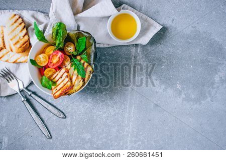 Cherry Tomato Salad With Grilled Haloumi Cheese, With Chard And Arugula