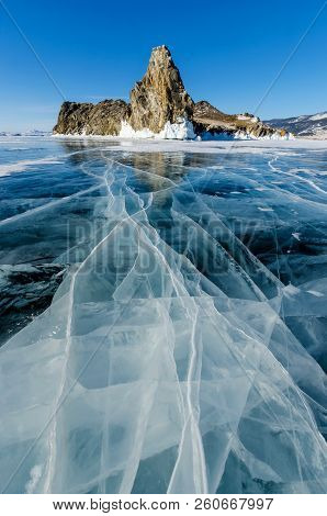 View Of Beautiful Drawings On Ice From Cracks And Bubbles Of Deep Gas On Surface Of Baikal Lake In W