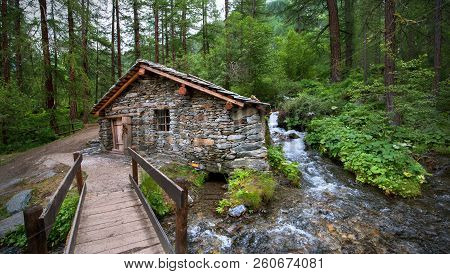 Old Water Mill Near Water Generate Electricity In Aplpien Village