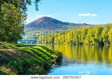 Radobyl Mountain In Ceske Stredohori, Central Bohemian Uplands. View From Labe River In Litomerice, 