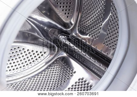 Washing Machine Drum Close Up, Laundry Concept.