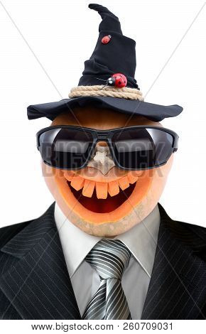 Portrait Of Jack Lantern  From Pumpkin In Black Business Suit. Pumpkin For Halloween Carved In The S