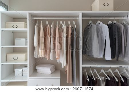 Modern Closet With Clothes