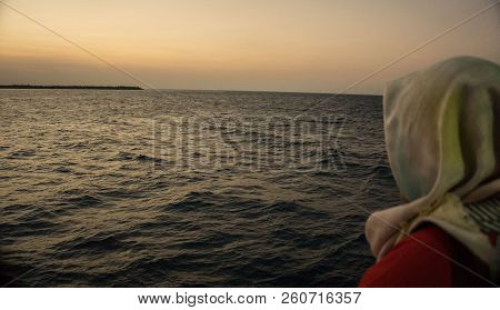 A Girl Moslem With Veil Standing In Front Of Big Sea Overseas In Karimun Jawa Indonesia