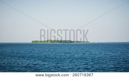 Karimun Jawa Island In The Middle Of Deep Blue Sea In Central Java Indonesia And Green Island