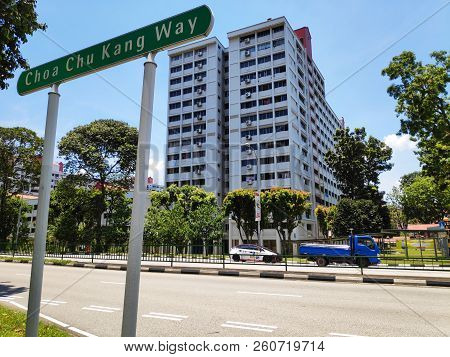 Singapore-23 Sep, 2018: Singapore Residential Housing Estate With Choa Chu Kang Way Road Sign And Bl