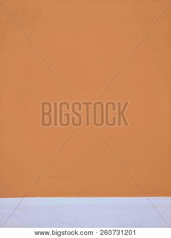 Intence Orange Color Outdoor Wall Surface, Painted With Bottom White Stripe. Wall With Small Brush S