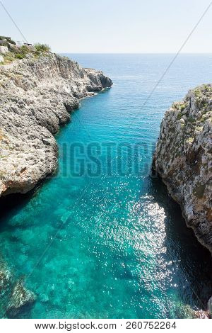 Apulia, Leuca, Italy, Grotto Of Ciolo - Reflecting Sunlight On The Water Surface