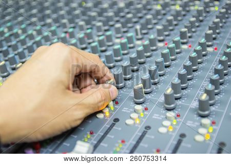 Close-up Hand Of Man Control Mixing Console Of A Big Hifi System The Audio Equipment, Control Panel 