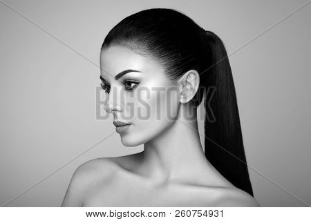 Beautiful Young Woman With Clean Fresh Skin. Perfect Makeup. Beauty Fashion. Eyelashes. Cosmetic Eye