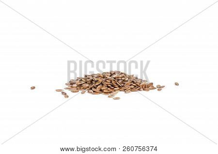 Lot Of Whole Fresh Brown Flaxseeds Isolated On White Background