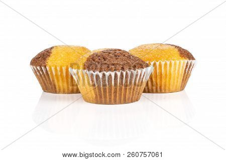 Set Of Three Whole Fresh Baked Marble Muffin Isolated On White Background