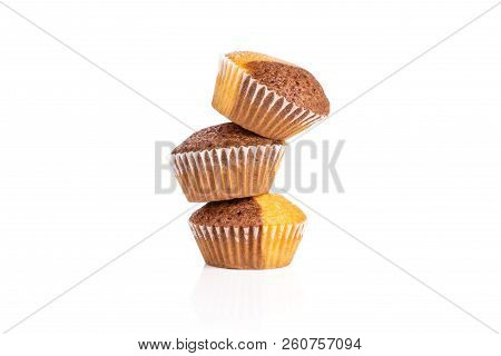 Group Of Three Whole Fresh Baked Marble Muffin Isolated On White Background
